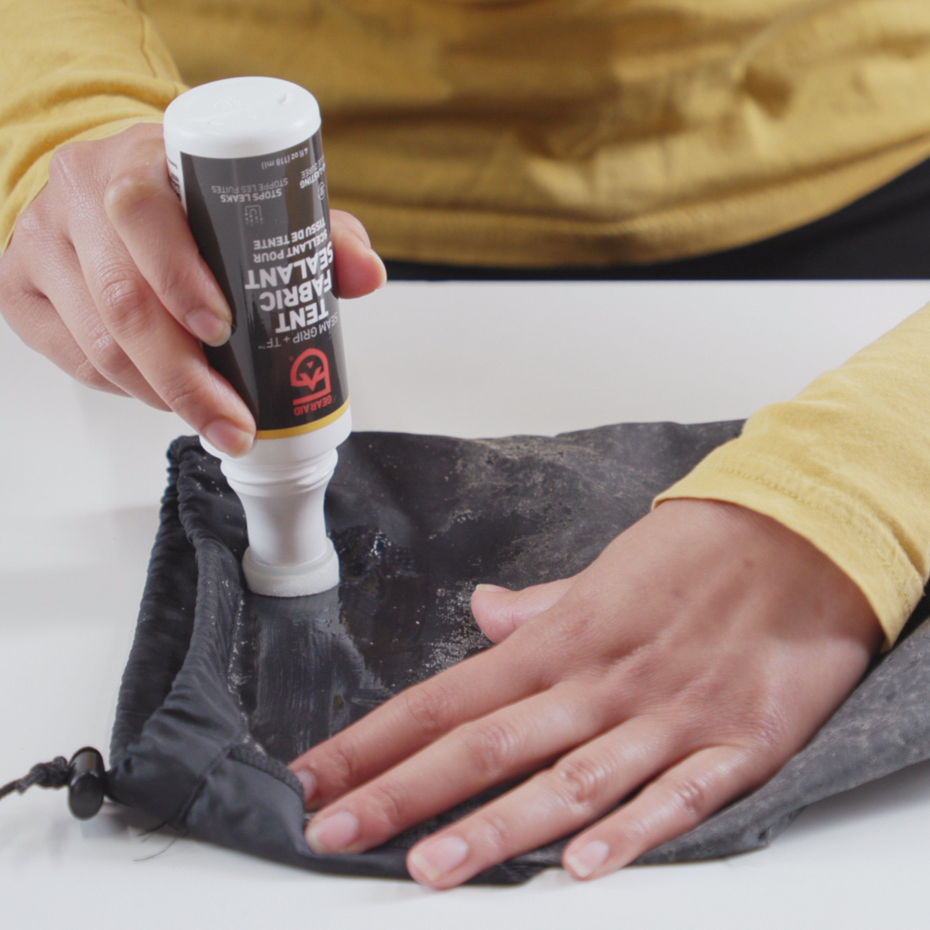 Canvas seam outlet sealer